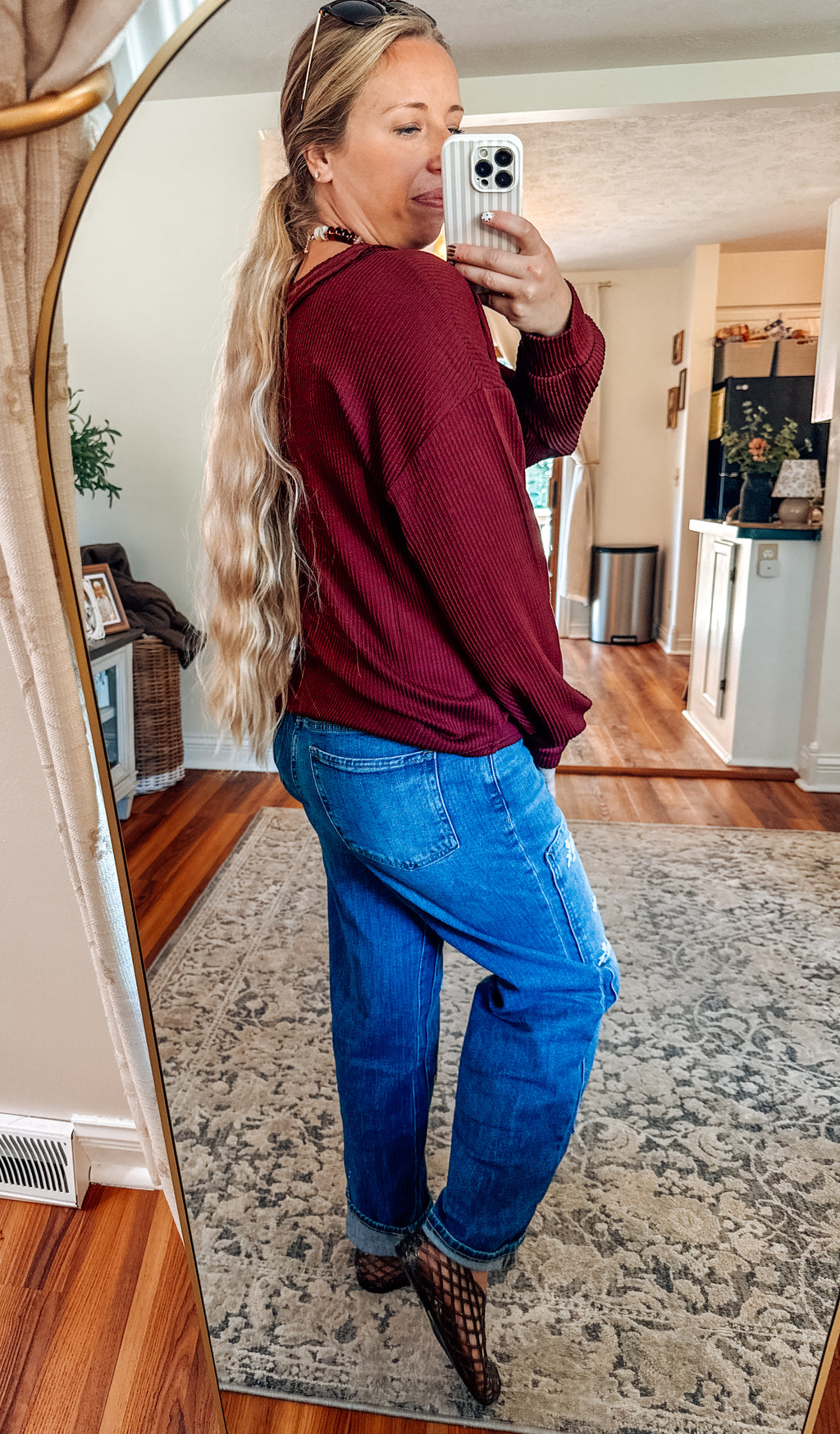 Crimson Raw Edge VNeck Knit Top